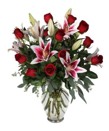 PINKS AND RED using ROSES AND LILIES