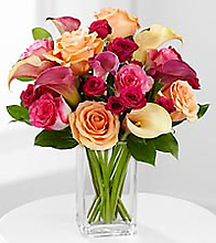 Mixed mini callas and roses in vase