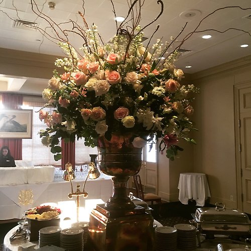 Gold and Copper Urn with flowers