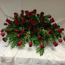 All roses with accents of green orchids